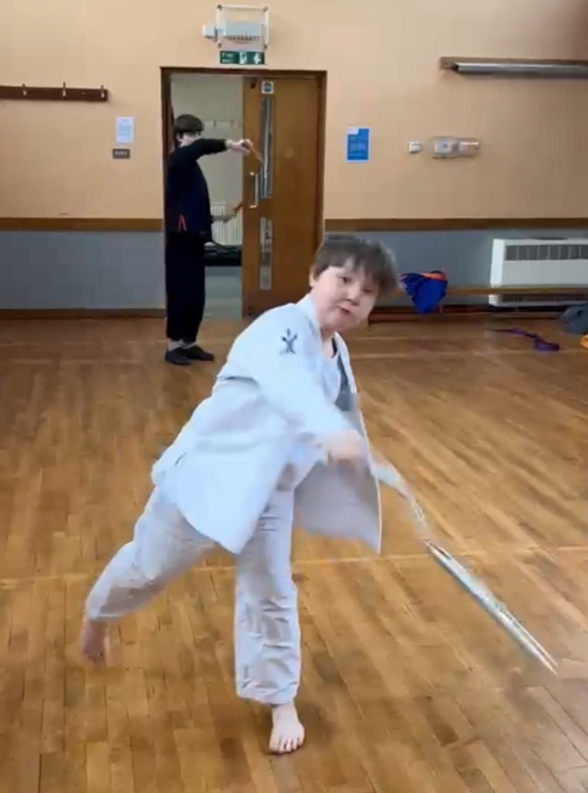 Nun-Chuck-Budo-training.jpg Oscar and the Art of the Nunchaku Oscar is learning nunchucks in Budo,